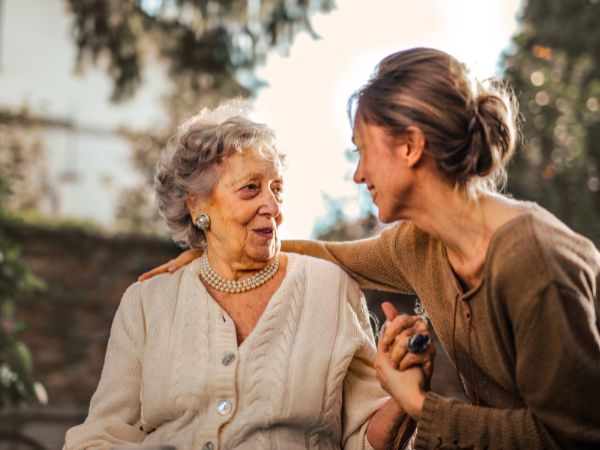 Caregiver assisting senior